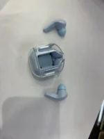 blue earbuds with transparent charging case