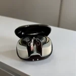 black and white true wireless earbuds with charging case